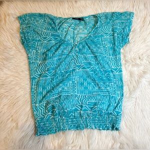 APT.V blue shirt. The size is XS